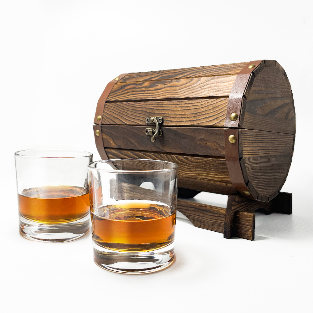 2 whiskey glases with a drum